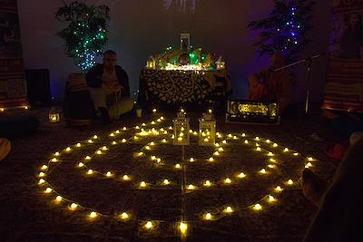 A circle of lights prepared for a Sacred Lounge event
